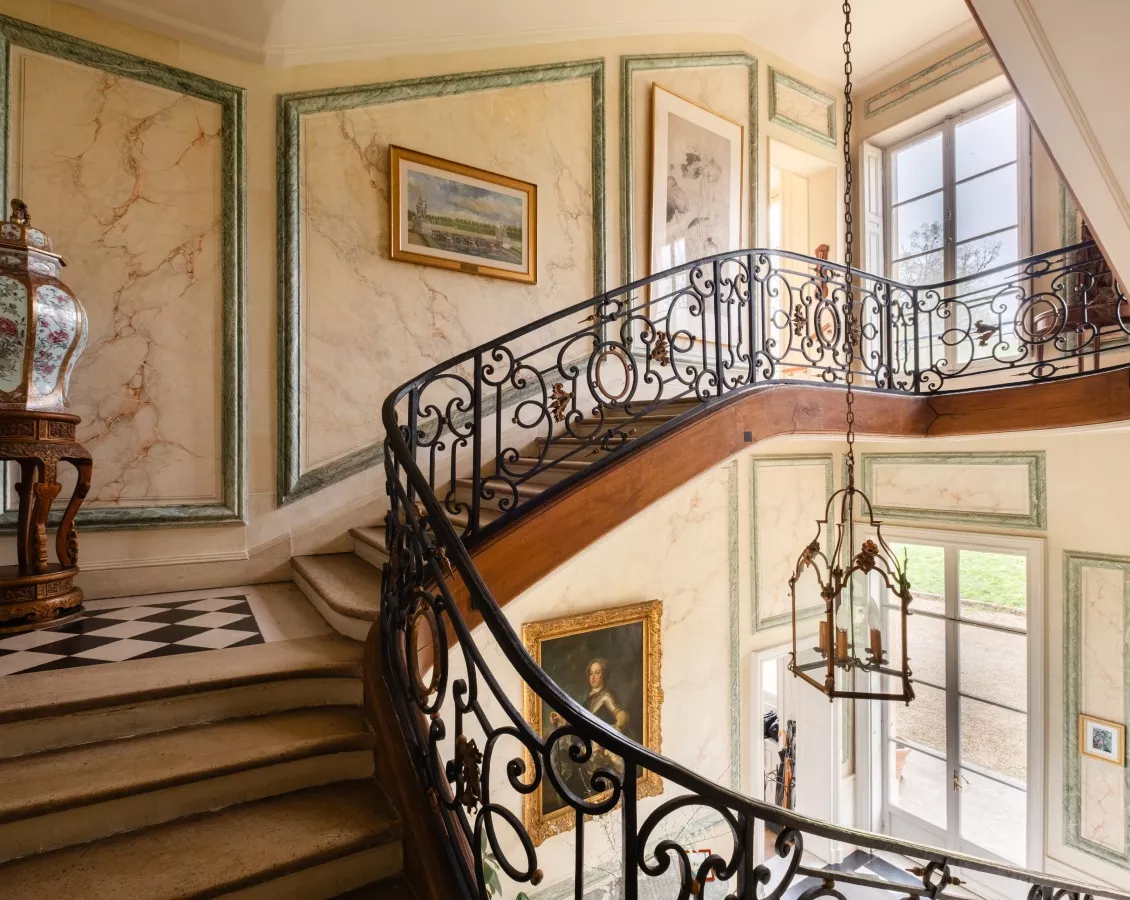 Photo of the staircase of a historic castle